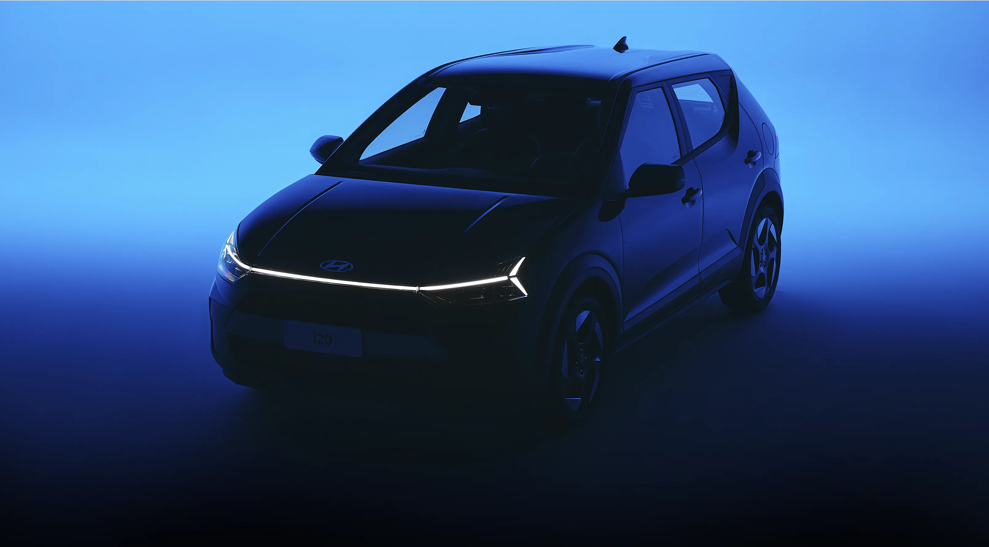 Farol em led com linha horizontal do Novo Hyundai i20 aceso. 