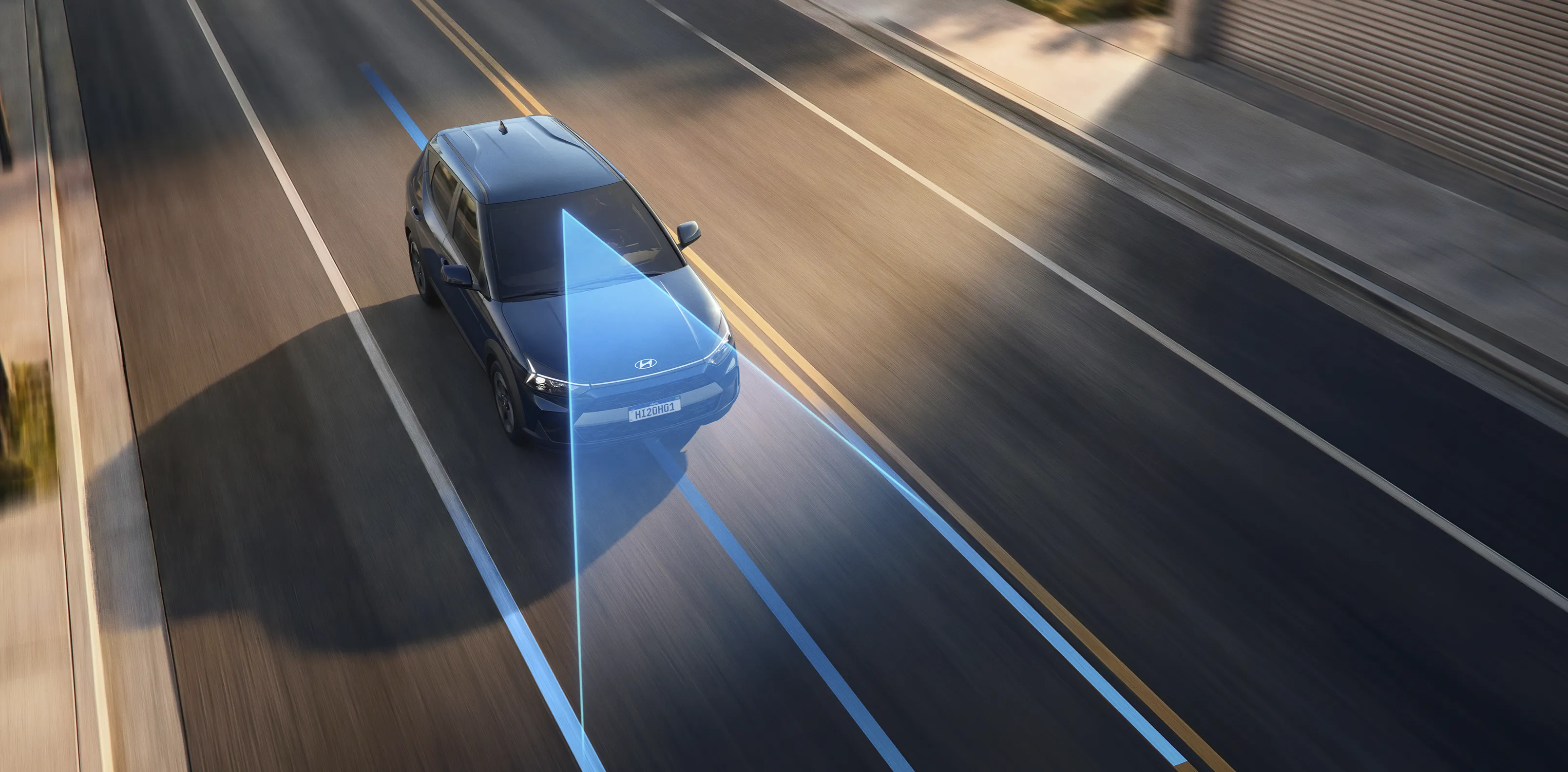 Assistente de Permanência e Centralização em Faixa (LFA e LKA) corrigindo o trajeto do Novo Hyundai i20. 