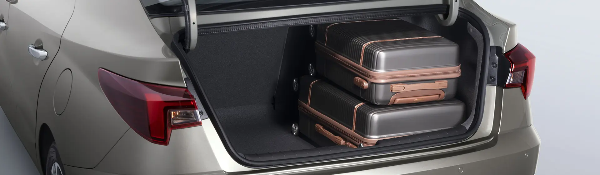 Porta-malas do HB20S na cor cinza com duas malas posicionadas em fileira vertical.