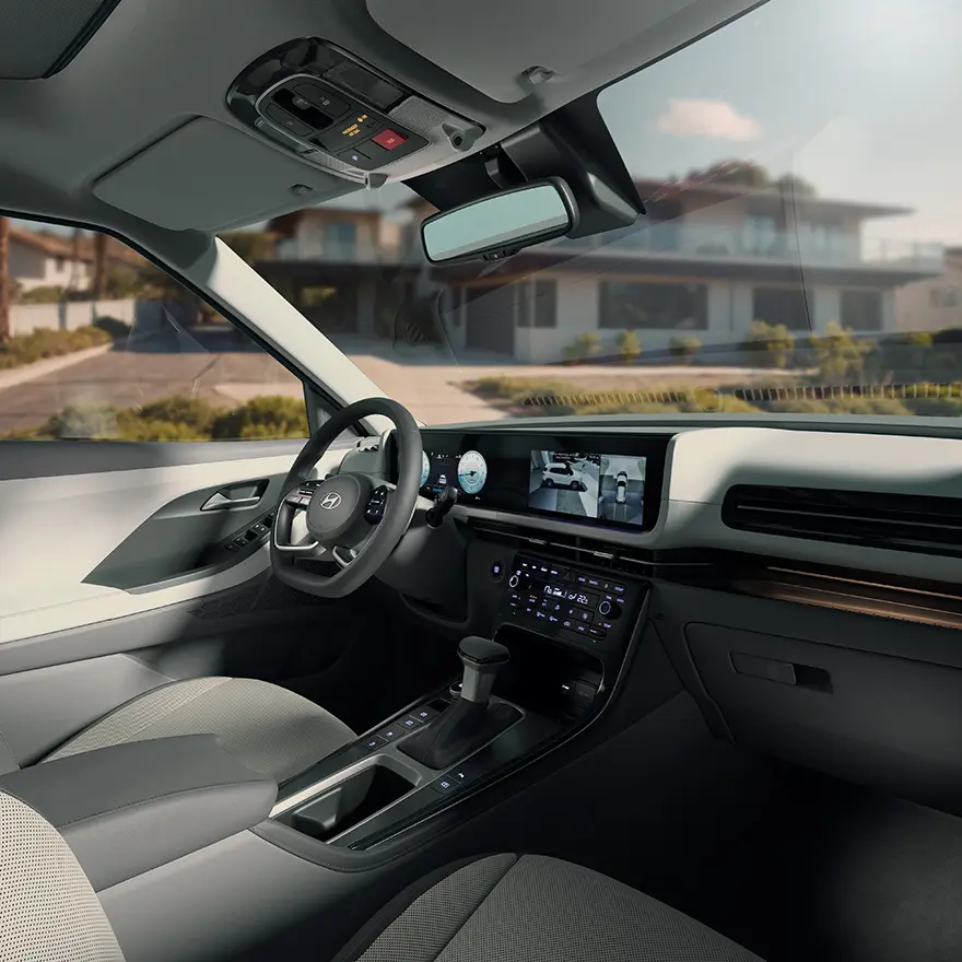 Interior do Novo CRETA Ultimate, destacando o banco do motorista, console central e painel integrado de 10,25”.